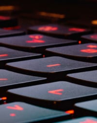 A keyboard with red lighting